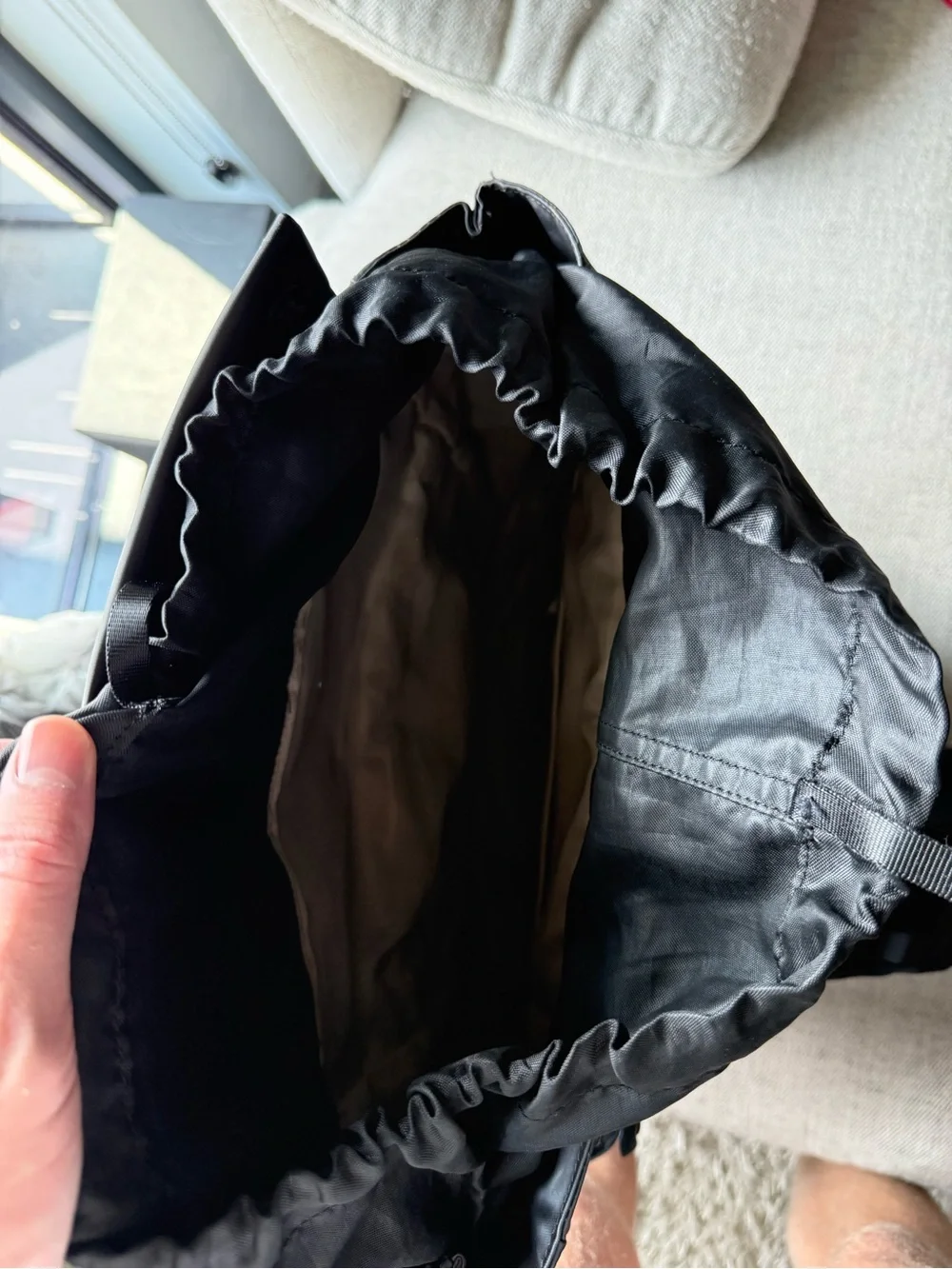 The North Face Black Roll-Top Travel Backpack